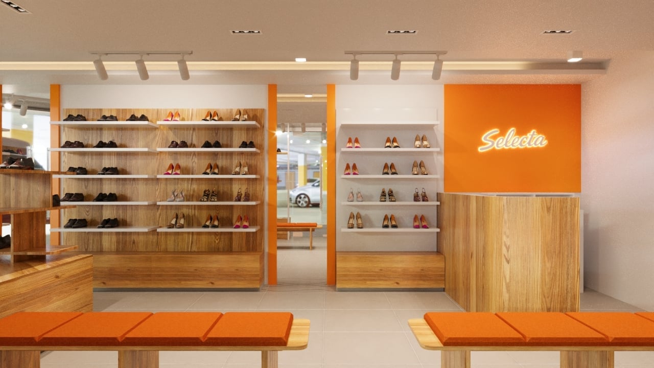 Modern shoe store interior with orange accents, wooden display shelves, orange benches, and Salette branding on the wall