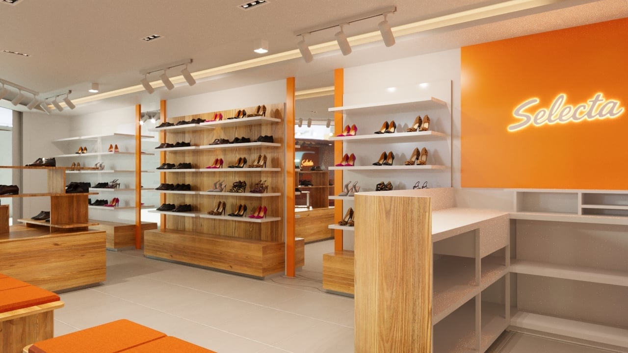 Modern retail shoe store interior with wooden shelving displays, orange accent wall with Salesha logo, and clean minimalist design